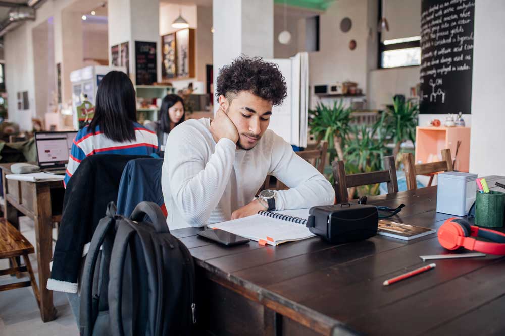 Student studying at a desk