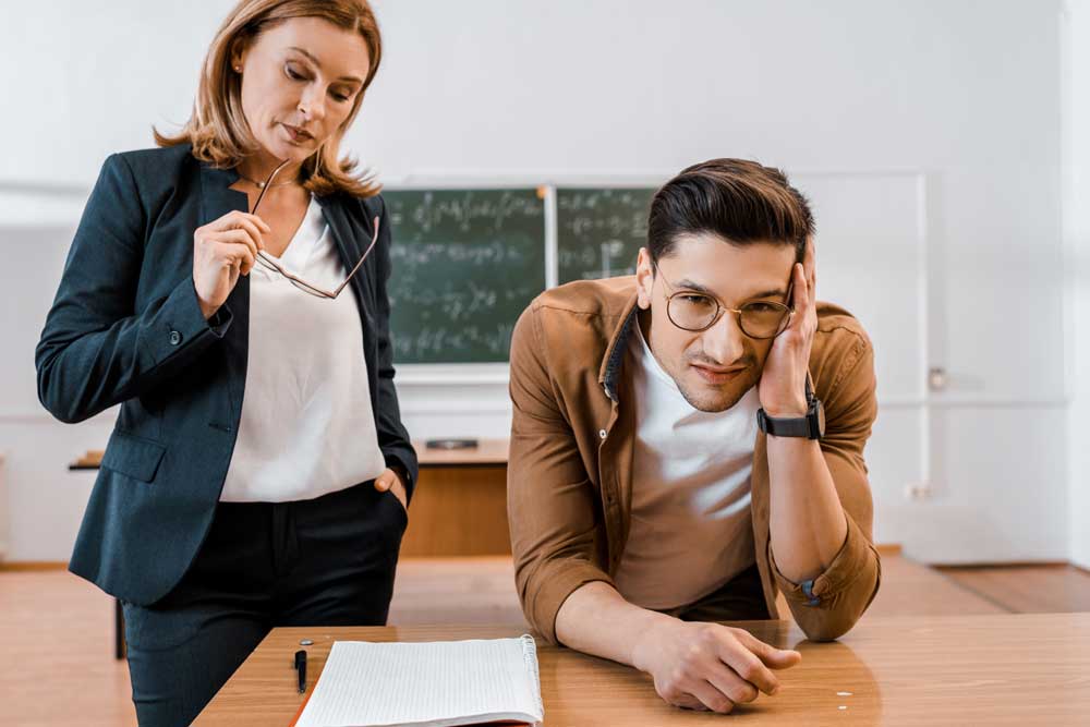 Unhappy teacher and student