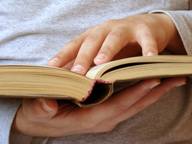 Student reading a book