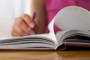 Person studying with a book