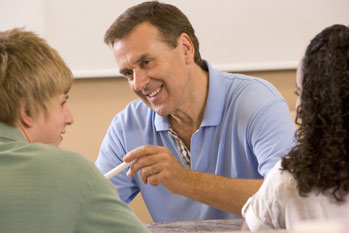 Teacher discussing with students